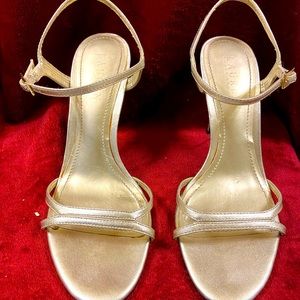 Light gold holiday Ralph Lauren heels size 7.  Gently used